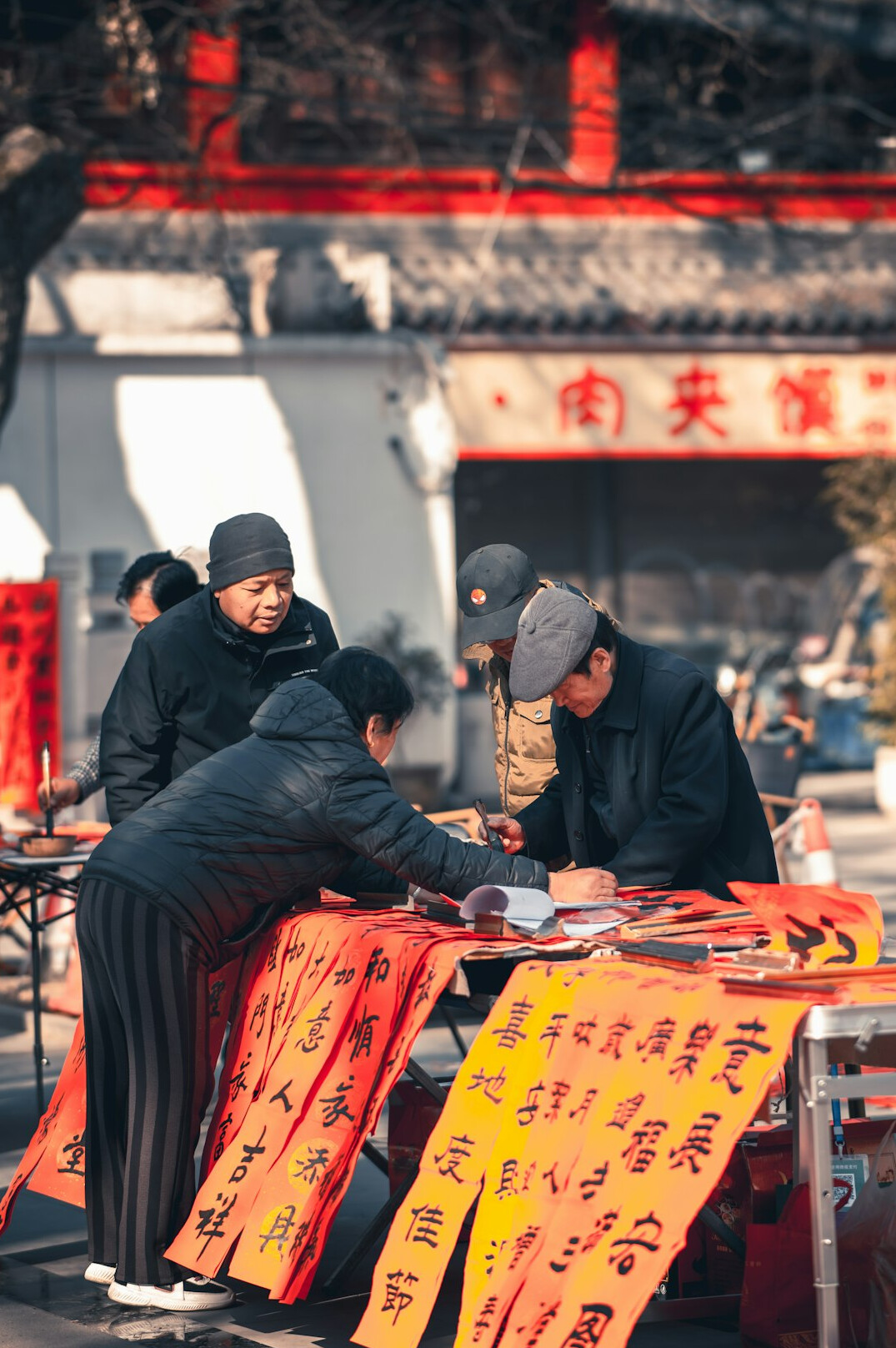 Two professionals signing a contract at a desk